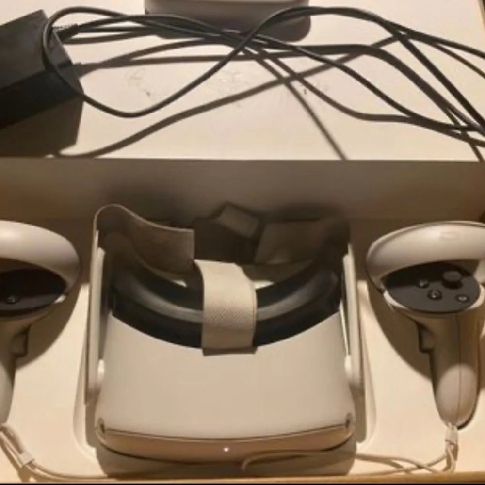 Oculus quest 2 headset with controllers and charger